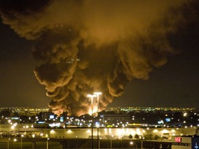 Smoke rises into the air following the Sunrise Propane explosion in the early morning of Aug. 10, 2008.