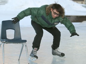 Dreamco Li from Gongdong, China braves the cold at the Forks while skating for the first time in Winnipeg Thursday January 19, 2012.BRIAN DONOGH/WINNIPEG SUN/QMI AGENCY