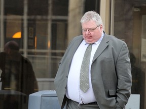 Mark Stobbe, a former Manitoba and Saskatchewan government employee accused of killing his wife Beverley Rowbotham at their home in St. Andrews in 2000, leaves the Law Courts on Mon., Jan. 30, 2012. Stobbe is on trial for second-degree murder. (JASON HALSTEAD/Winnipeg Sun