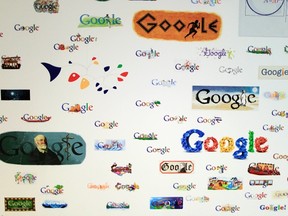 Google homepage logos are seen on a wall at the Google campus near Venice Beach, in Los Angeles, California Jan. 13, 2012.  REUTERS/Lucy Nicholson