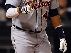 Tigers designated hitter Victor Martinez watches his home run against the White Sox U.S. Cellular Field in Chicago, Ill., Sep. 13, 2011. (FRANK POLICH/Reuters)