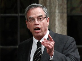 Canada's Natural Resources Minister Joe Oliver speaks during Question Period in the House of Commons on Parliament Hill in Ottawa January 30, 2012.    REUTERS/Chris Wattie    (CANADA - Tags: POLITICS)