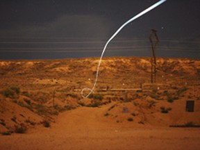 U.S. researchers have developed a self-guided bullet. The 10 cm, dart-like bullet can hit laser-designated targets more than 1.6 km away. Sandia National Laboratories/HANDOUT