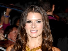 Danica Patrick, seen here attending the world premiere of The Twilight Saga: Breaking Dawn - Part 1, last November, is guaranteed a spot in the Daytona 500 after buying a qualifying exemption from another race team. (WENN PHOTO)