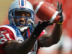 Alouettes wide receiver Kerry Watkins catches a pass during the warmup prior to facing the Stampeders at McMahon Stadium in Calgary, Alta., Aug. 27, 2011. (AL CHAREST/QMI Agency)
