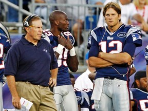 New England Patriots quarterback Tom Brady (right), wide receiver Chad Ochocinco and head coach Bill Belichick  look on during a preseason game against Jacksonville. The season didn't turn out the way Ochocinco intended, though he is playing in the Super Bowl. (REUTERS)
