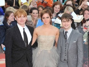 Emma Watson, Daniel Radcliffe, Rupert Grint at the premiere of Harry Potter And The Deathly Hallows: Part 2 on July 7, 2011. (WENN.com)