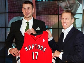 Raptors' first-round draft pick Jonas Valanciunas with club president Bryan Colangelo. (REUTERS)