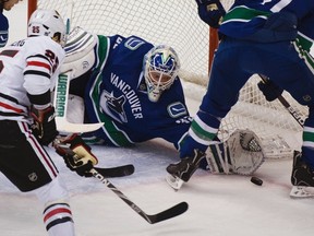 Canucks goaltender Cory Schneider stops a shot by Blackhawks forward Viktor Stalberg at Rogers Arena in Vancouver, B.C., Jan. 31, 2012. (ANDY CLARK/Reuters)