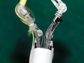 A Master And Slave Transluminal Endoscopic Robot is seen at a lab in Singapore in this undated close-up handout photo.  (Handout)