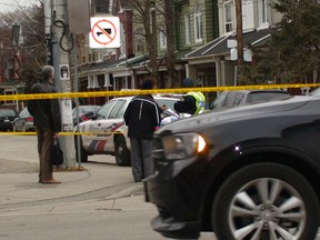 Toronto Police investigate the body of a woman found in the west end Jan. 30. (KEVIN CONNOR/Toronto Sun)