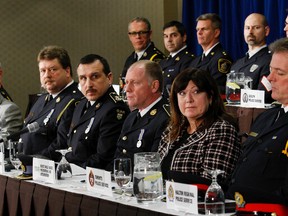 Law enforcement hold a press conference in Vaughan Thursday to announce the results of a recent child porn sweep. (CRAIG ROBERTSON/Toronto Sun)