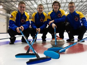 Brendan Bottcher, right, poses with his rink (from left) Bryce Bucholz, Landon Bucholz and Evan Asmussen. This is Bottcher's second trip to junior nationals. (Codie McLachlan, Edmonton Sun)