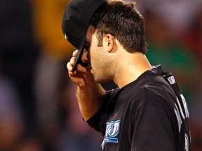 Blue Jays starter Brandon Morrow reacts after giving up a run against the Red Sox at Fenway Park in Boston, Mass., Sep. 13, 2011. (ADAM HUNGER/Reuters)
