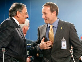 U.S. Defense Secretary Leon Panetta (L) chats with Canada's Defence Minister Peter McKay before a North Atlantic Council (NAC) meeting at a NATO Defence Ministers meeting in Brussels February 2, 2012. (REUTERS/Sebastien Pirlet)