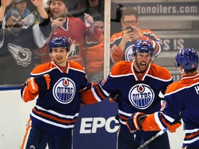 Oilers forward Sam Gagner celebrates one of his four goals with his teammates in the third period of Thursday's game against the Chicago Blackhawks at Rexall Place. (Reuters)