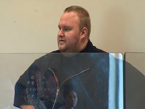 Founder of online file-sharing site Megaupload.com Kim Dotcom, a German national also known as Kim Schmitz and Kim Tim Jim Vestor, attends a hearing at the North Shore District Court in Auckland, in this still image taken from video January 25, 2012. (REUTERS/Television New Zealand)