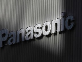 Panasonic's logo is seen on a wall of an electronic shop in Tokyo February 3, 2012.  (REUTERS/Kim Kyung-Hoon)