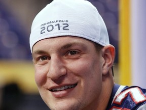 Pats tight end Rob Gronkowski looks out at a sea of reporters during Super Bowl media day in Indianapolis on Jan. 31, 2012. (REUTERS/Jim Young)
