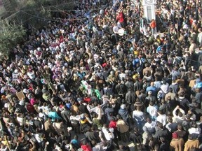 Demonstrators take part in a protest against Syria's President Bashar al-Assad after Friday prayers at Inshaat district in Homs February 3, 2012. (REUTERS/Handout)