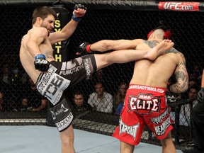 Carlos Condit (left) is ready to face Nick Diaz on Saturday night. (Getty Images, files)
