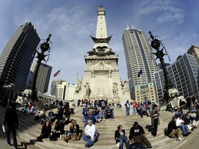Fans pose for photos around Super Bowl Village in downtown Indianapolis. An overwhelming majority of them will be rooting for the New York Giants to win Sunday's Super Bowl. (GETTY IMAGES)