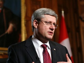 Canada's Prime Minister Stephen Harper speaks before the start of an interview with Reuters in his office on Parliament Hill in Ottawa February 3, 2012.  REUTERS/Chris Wattie