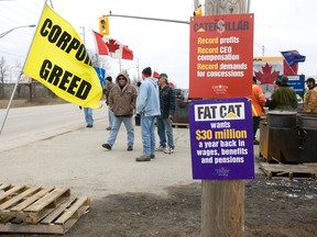 Locked out employees man the picket line at Electro-Motive Canada in London, Ont., on Wednesday, February 1, 2012. The company is shutting down its locomotive production company in the city according to a news release. DEREK RUTTAN/QMI AGENCY
