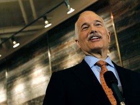 Former NDP leader Jack Layton talks to the media during a campaign stop in Montreal, April 26, 2011.   (REUTERS/Shaun Best)