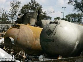Large propane tanks are seen in the midst of wreckage the day after large explosions at the Sunrise Propane facility in Toronto, August 11, 2008. A series of explosions at a Toronto propane depot sent balls of flame soaring into the sky on Sunday and forced thousands of people from their homes.