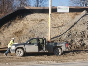 Construction work on the Eglinton Crosstown goes on near Black Creek Dr. while the debate rages at City Hall. (JOE WARMINGTON/Toronto Sun)