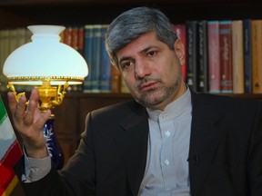 Iranian Foreign Ministry Spokesman Ramin Mehmanparast speaks with a Reuters correspondent during an interview in Tehran June 29, 2011. (REUTERS/Caren Firouz)
