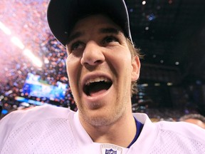 New York Giants quarterback Eli Manning celebrates after his team defeated the New England Patriots in  Super Bowl XLVI. (REUTERS)
