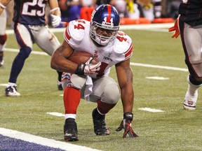 New York Giants running back Ahmad Bradshaw teeters in front of the goal line. If he hadn't scored and the Giants kicked a field goal instead, a number of  losing prop bets might have been winners. (REUTERS)
