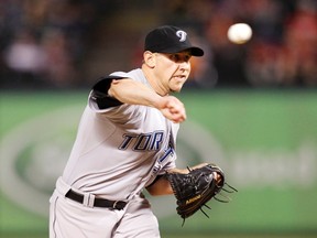 Reliever Shawn Camp pitches against the Rangers at Rangers Ballpark in Arlington, Tex., April 26, 2011. (MIKE STONE/Reuters)