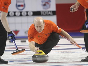 Kevin Martin delivers a rock at the Grand Slam event in Kingston (Michael Lea, QMI Agency).