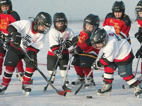 The weather is too unpredictable, and there are too many clubs for outdoor rinks to be a viable option in Winnipeg. (MARCEL CRETAIN/Winnipeg Sun files)