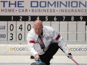 Skip Glenn Howard eyes an incoming rock during his first draw game against Dayna Deruelle at the Dominion Tankard in Stratford, Ont., Feb. 6, 2012. (SCOTT WISHART/QMI Agency)