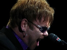 British singer Elton John performs during a concert at Simon Bolivar University stadium in Caracas, February 5, 2012. (REUTERS/Gil Montano)