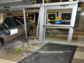 A silver minivan crashed through the doors of Queen Elizabeth Hospital in Charlottetown on Monday night. (Charlottetown Police Service)