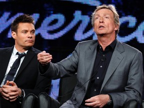 American IdolExecutive producer Nigel Lythgoe (R) and host Ryan Seacrest. (REUTERS/Lucy Nicholson/Files)