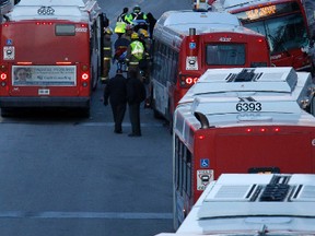 At least one person suffered minor injuries after two OC Transpo buses collided on the Transitway at Tunney's Pasture around rush hour Tuesday, February 7, 2012. 
 (DARREN BROWN/QMI AGENCY)