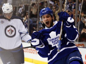 Maple Leafs forward Clarke MacArthur celebrates a goal against the Jets at the Air Canada Centre in Toronto, Ont., Jan. 5 2012. (DAVE ABEL/QMI Agency)