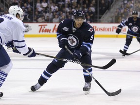 Jets forward Evander Kane chases the puck during Tuesday's game against the Toronto Maple Leafs. Kane returned to the lineup after missing seven games.
