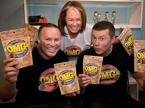 OMG! They got a deal! From left to right: Larry Finnson, Arlene Dickinson, Chris Emery (CNW Group/OMG's Candy)