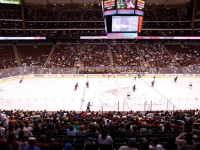 A less than packed arena watches as the Phoenix Coyotes play the Dallas Stars  on Tuesday March 29th at Jobbing.com Arena in Glendale, AZ. (QMI Agency)