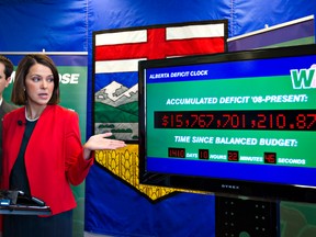Wildrose Party leader Danielle Smith releases her parties alternate budget in Edmonton, Alberta on Friday, February 10, 2012. They also unveiled their Alberta Deficit Clock that tallies their projected debt in realtime. AMBER BRACKEN/EDMONTON SUN