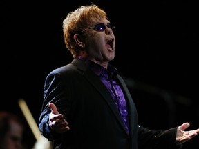 British singer Elton John performs during a concert at Simon Bolivar University stadium in Caracas February 5, 2012. REUTERS/Gil Montano