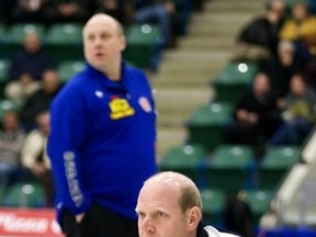 Skip Kevin Martin watches his shot, as Rob Schlender also looks on during the C Event final Saturday at the 2012 Boston Pizza Cup at the EnCana Arena in Camrose.