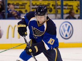 Blues forward Andy McDonald shoots the puck against the Wild at the Scottrade Center in St. Louis, Miss., Jan. 14, 2010. (DILIP VISHWANAT/Getty Images/AFP)